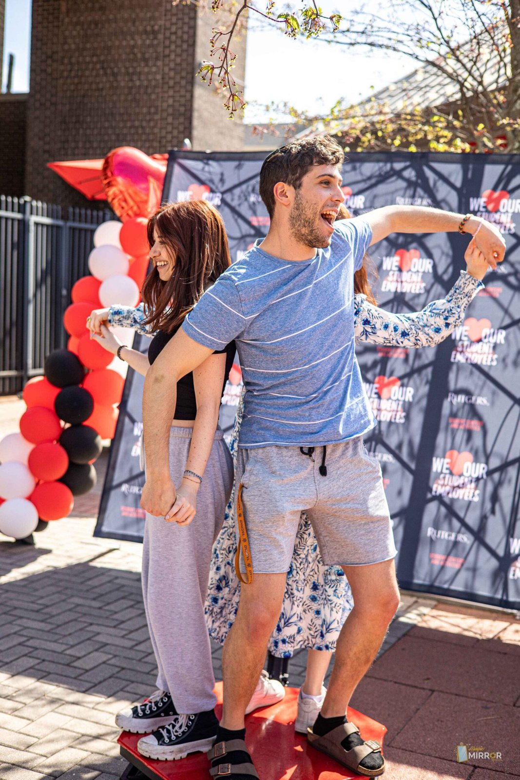 Guests dancing at an outdoor 360 booth activation