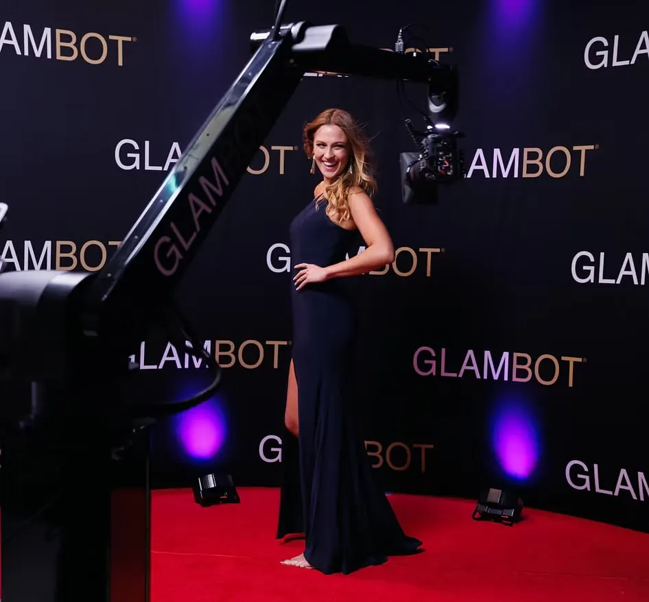 Glambot robotic camera arm filming a guest on the red carpet