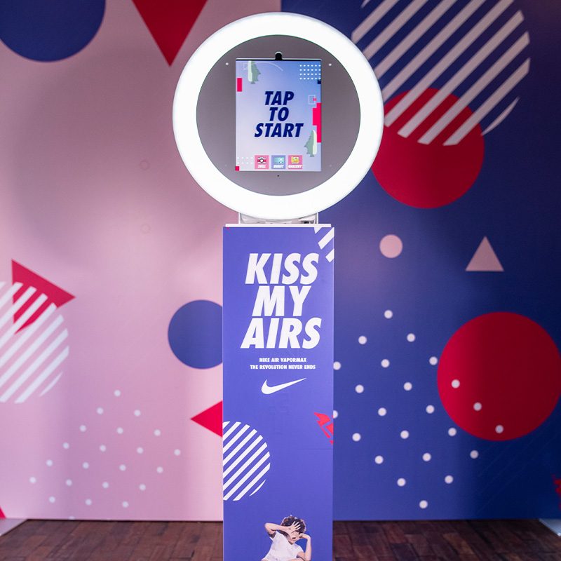Red carpet and branded booth setup at a New York brand activation
