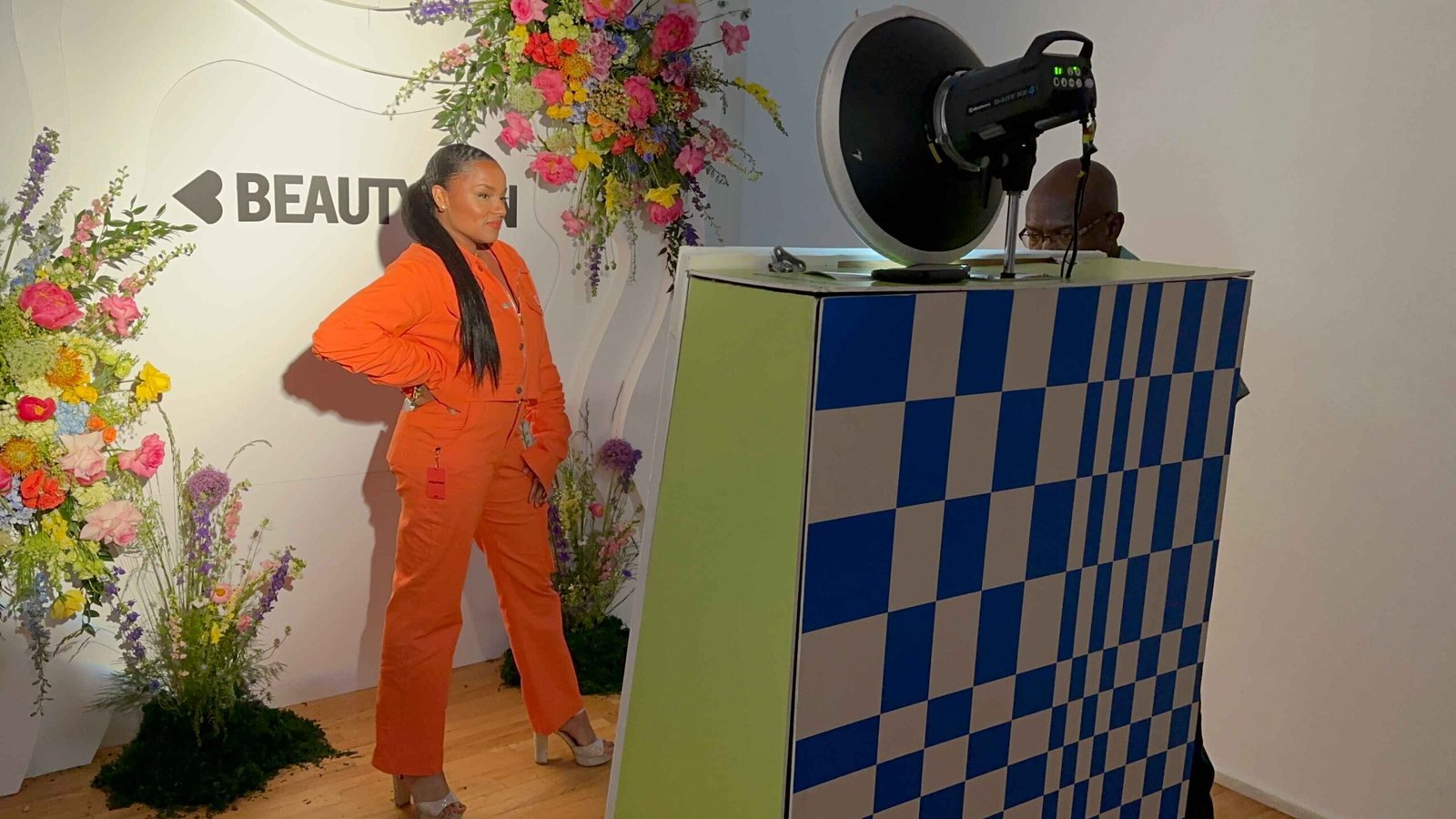 Attendee posing at the Beautycon branded booth