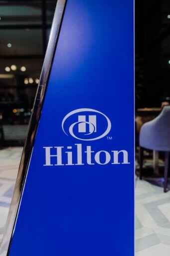 Hilton branding on the booth screen at a hotel activation