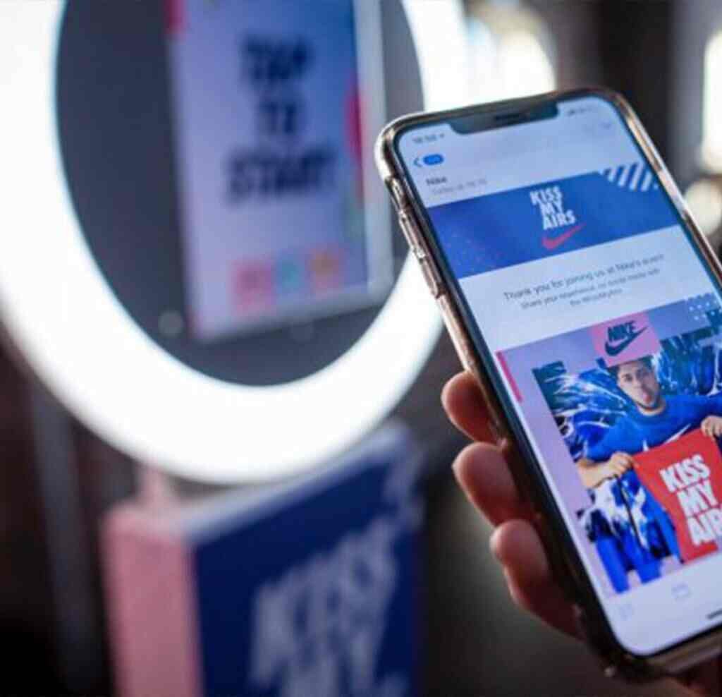 Guest receiving branded Nike photos on their phone at an activation