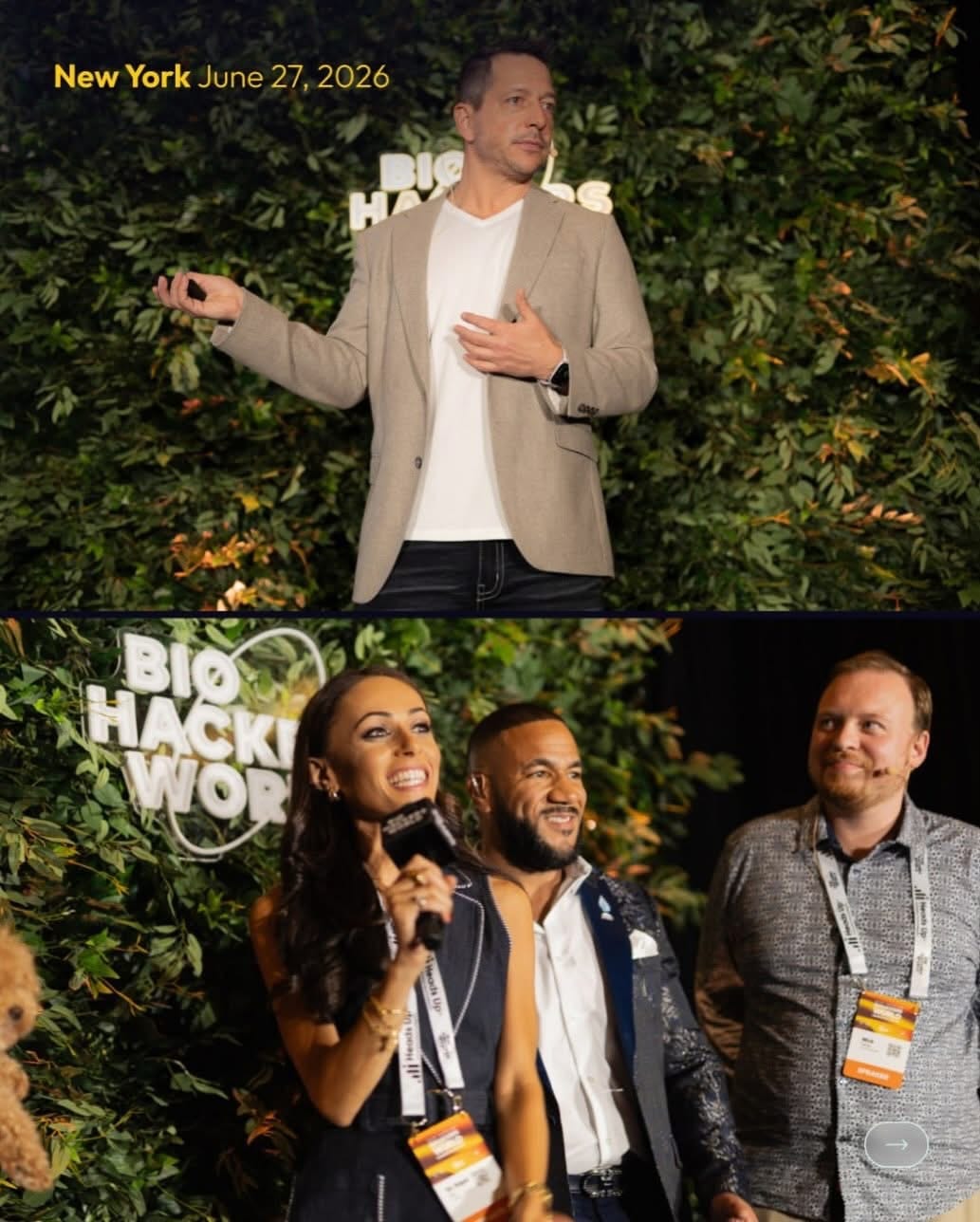 Speakers presenting in front of the greenery wall at a NYC conference