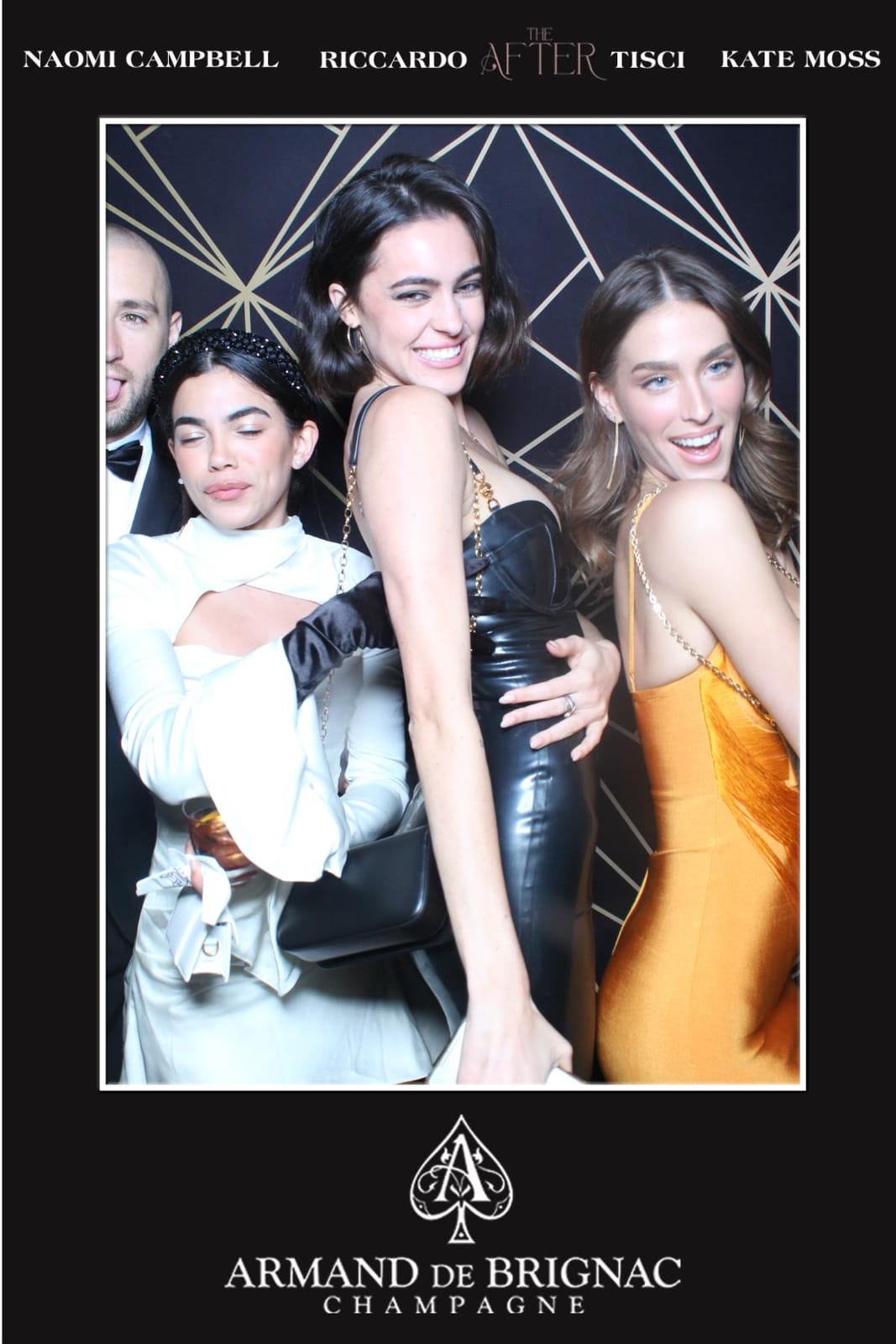 Three guests in cocktail dresses at the Armand de Brignac THE AFTER photo booth