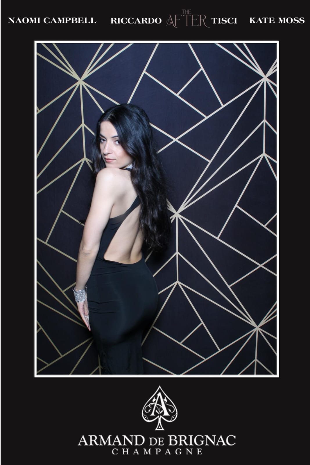 Guest in a black gown at the Armand de Brignac THE AFTER booth