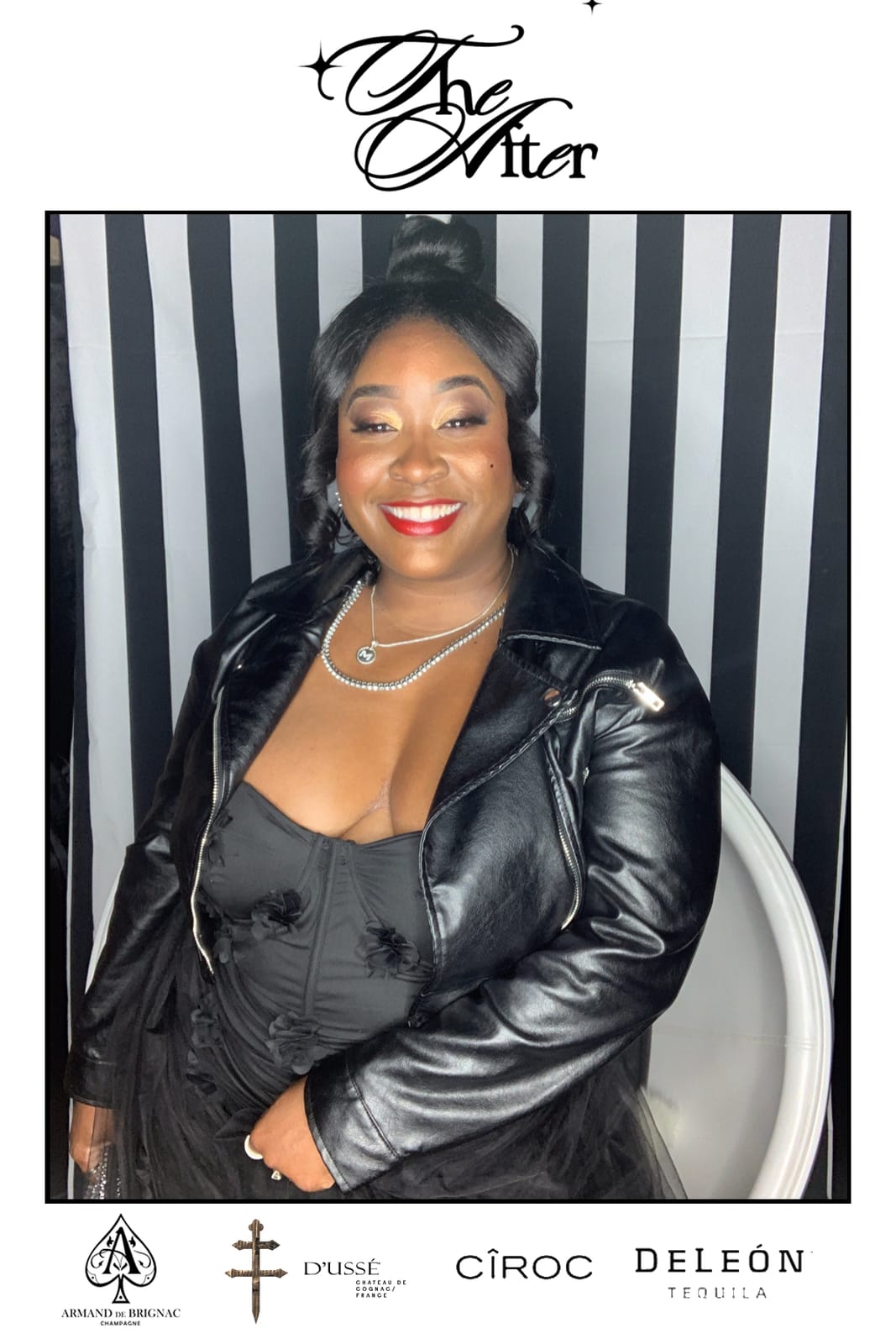 Guest in a leather jacket posing at THE AFTER photo booth