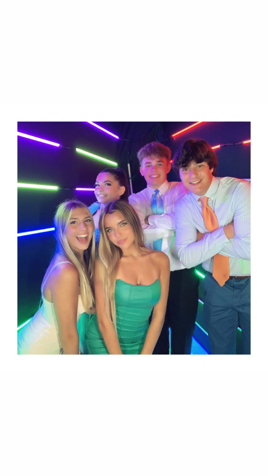 Friends celebrating candidly at THE AFTER neon lounge