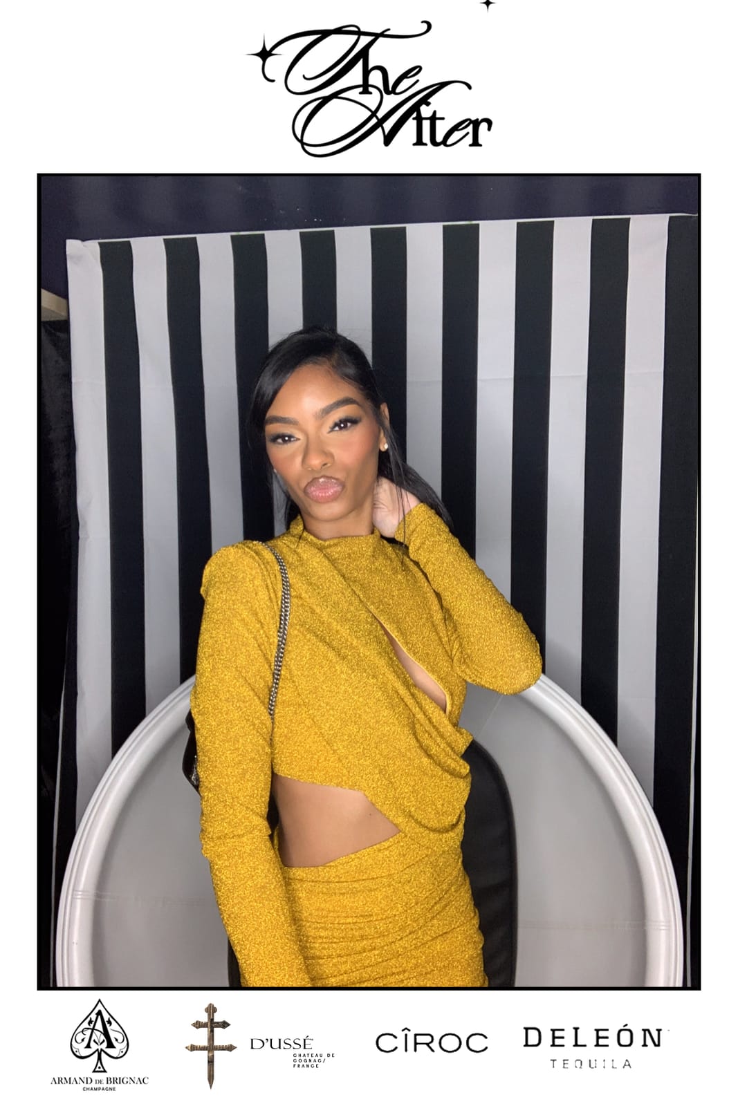 Guest in a mustard cutout dress posing at THE AFTER step-and-repeat