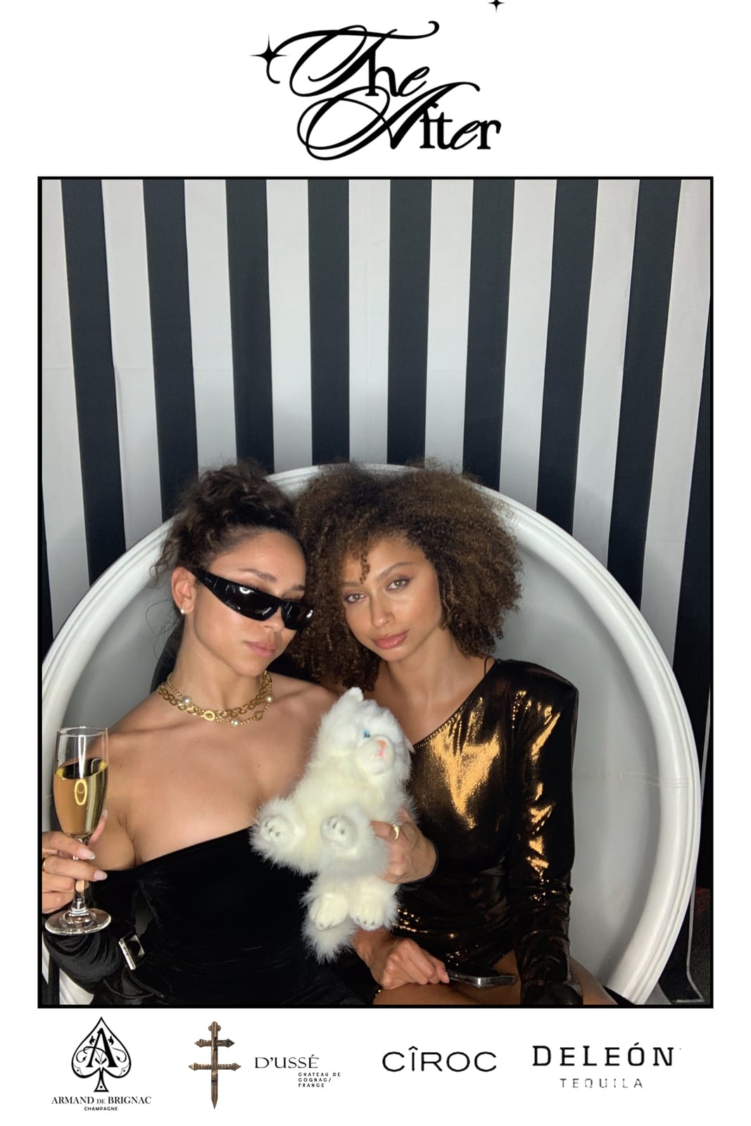 Two friends posing at THE AFTER photo booth