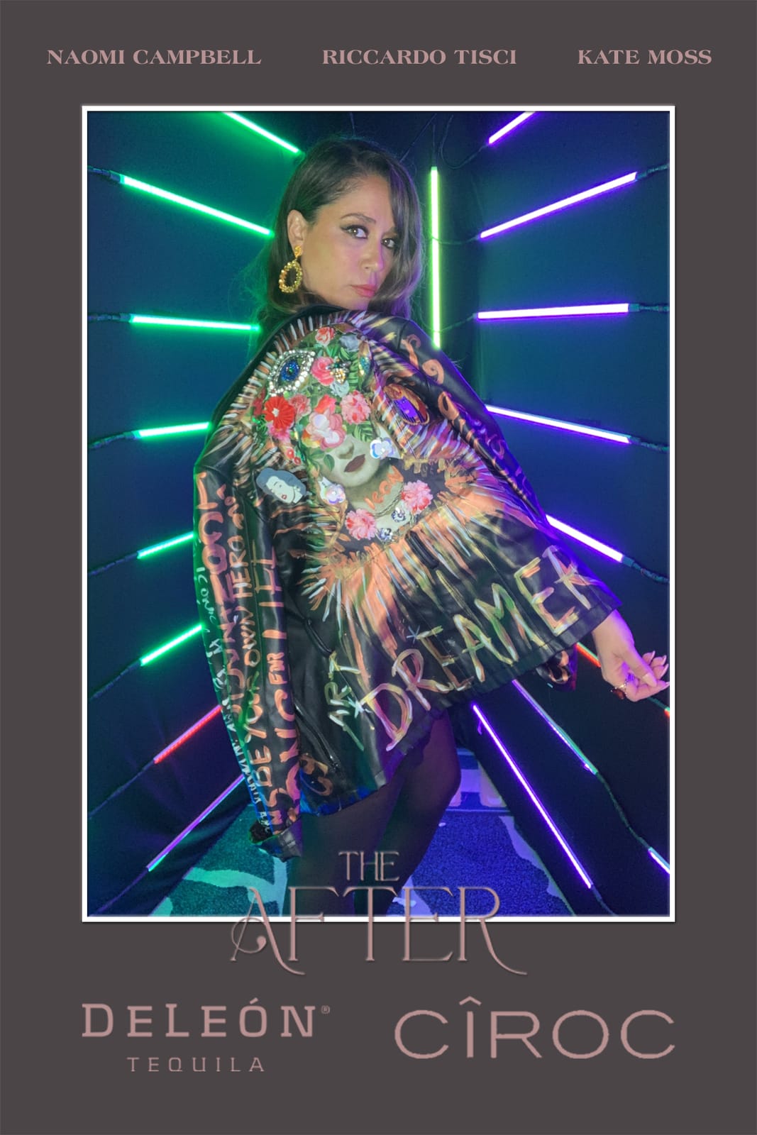 Guest posing at THE AFTER neon tunnel print frame