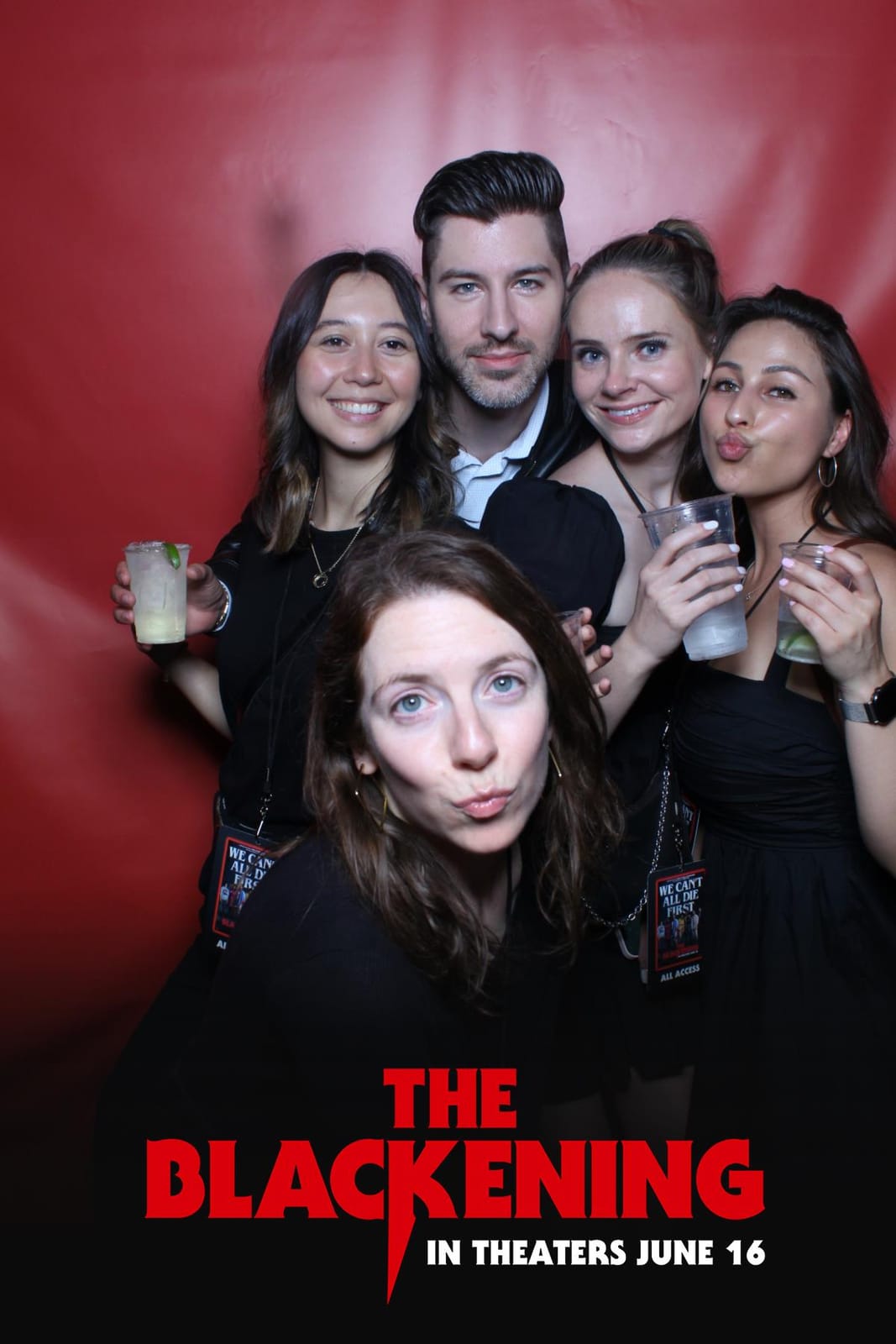 Big group crowding the frame at The Blackening premiere photo booth