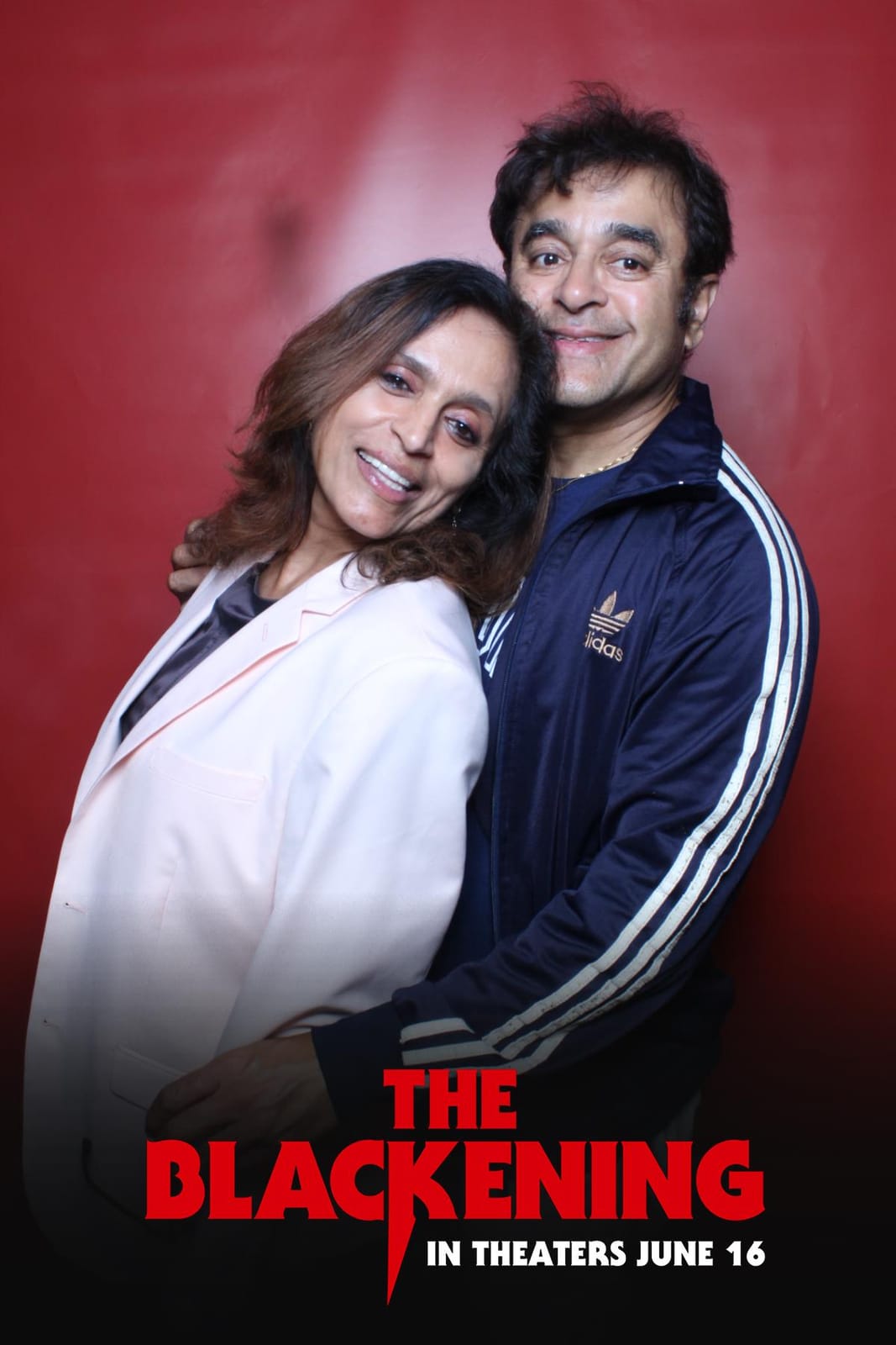 Friends posing at The Blackening film premiere red-wall booth