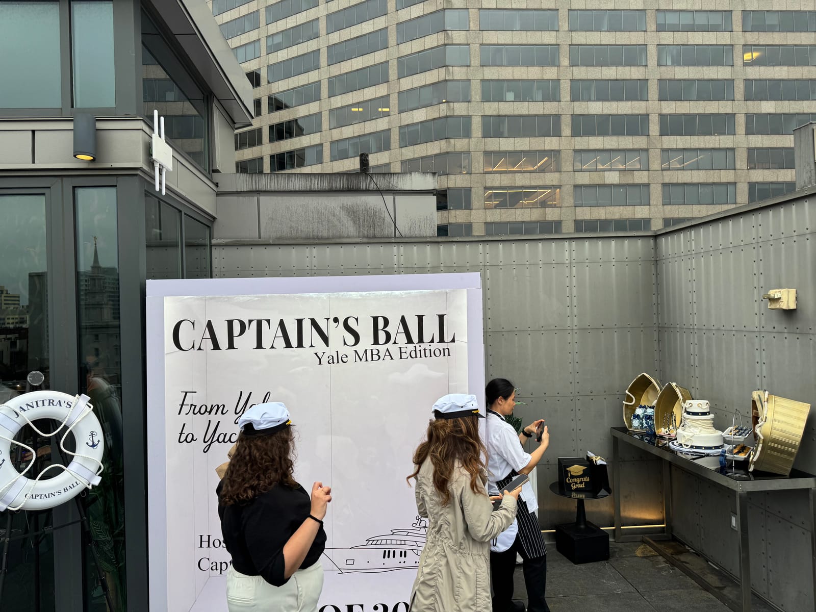 Champagne tower and celebration cake at the Captain's Ball Yale MBA reception