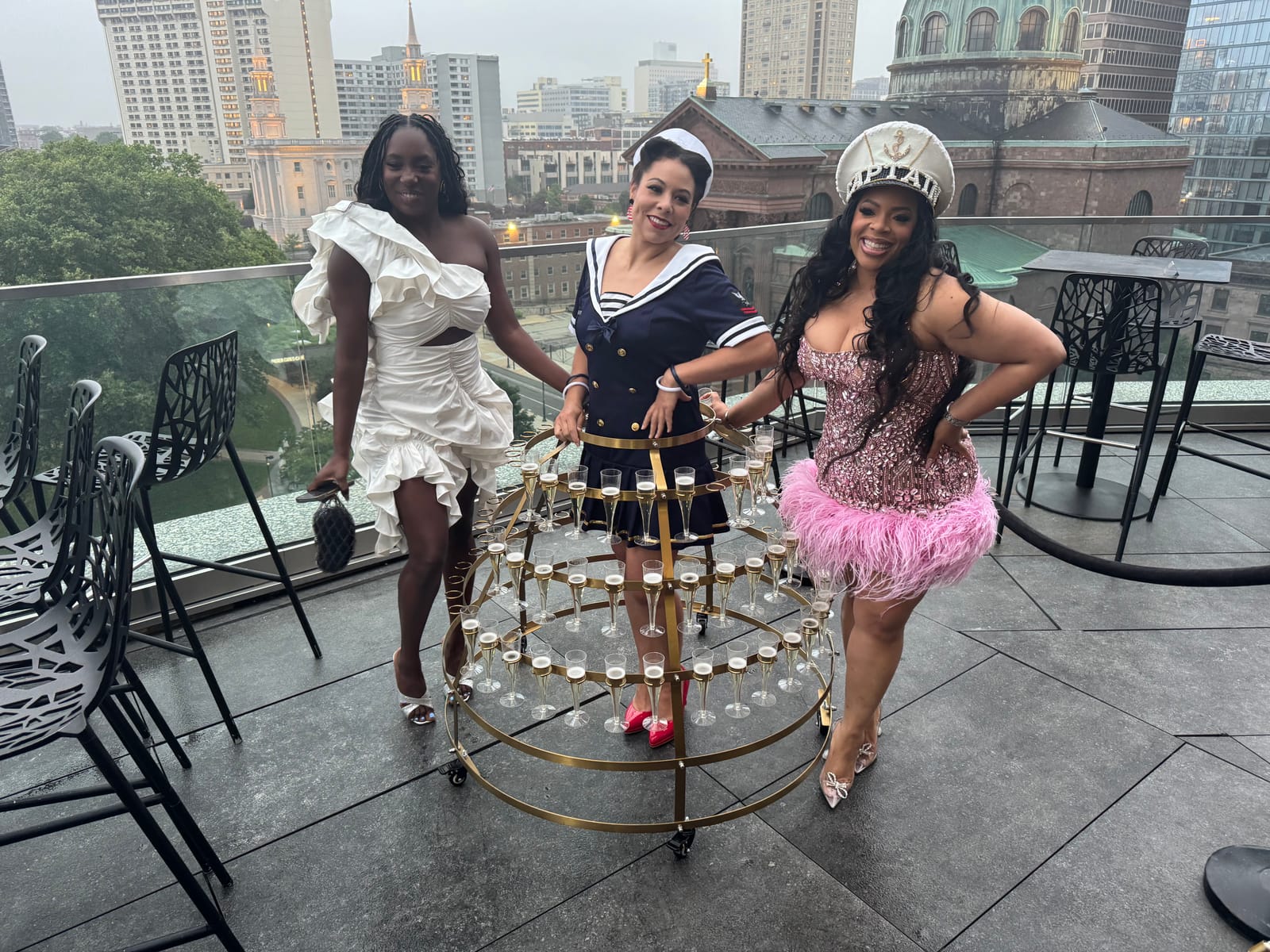Guests celebrating on the rooftop at the Captain's Ball Yale MBA Edition