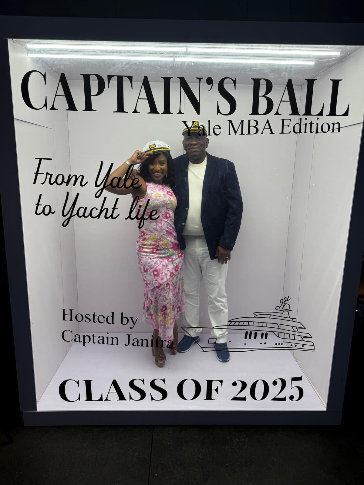 Guests posing at the Captain's Ball sign, Class of 2025