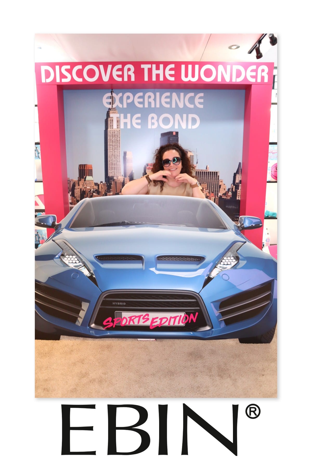 Guest posing solo at the EBIN New York sports-car photo prop