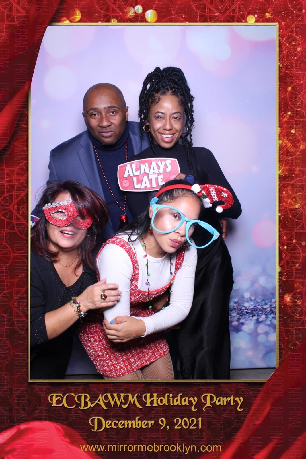 Colleagues posing at the ECBAWM Holiday Party