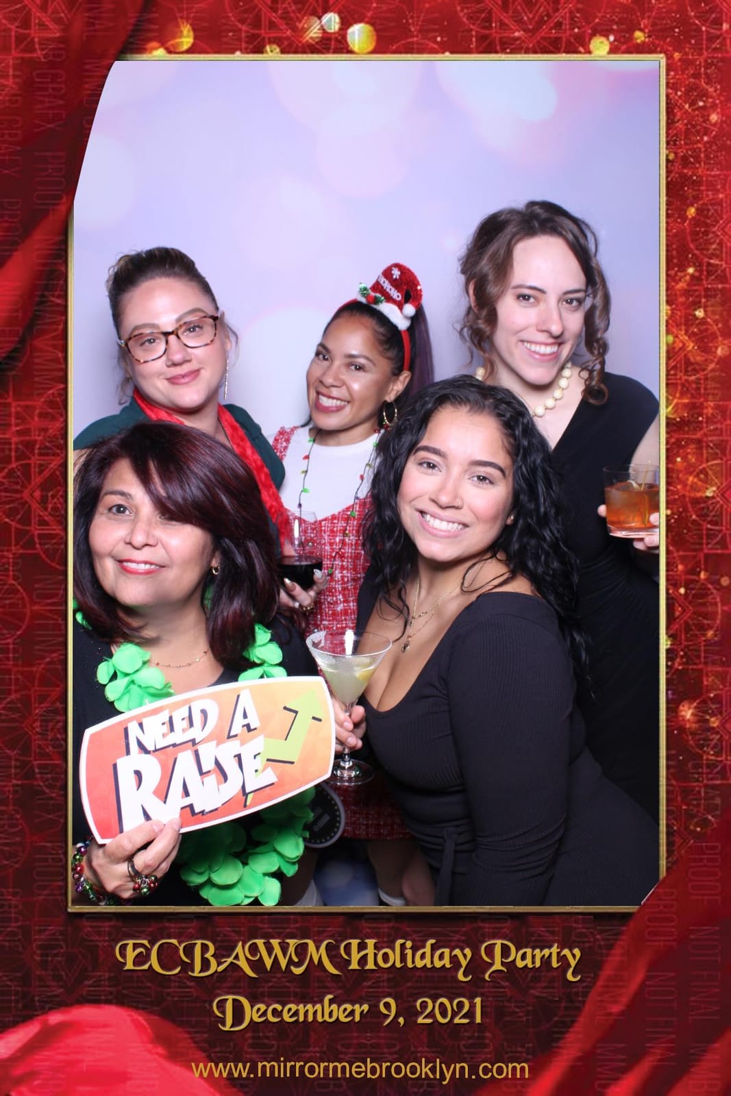 Guests posing together at the ECBAWM Holiday Party