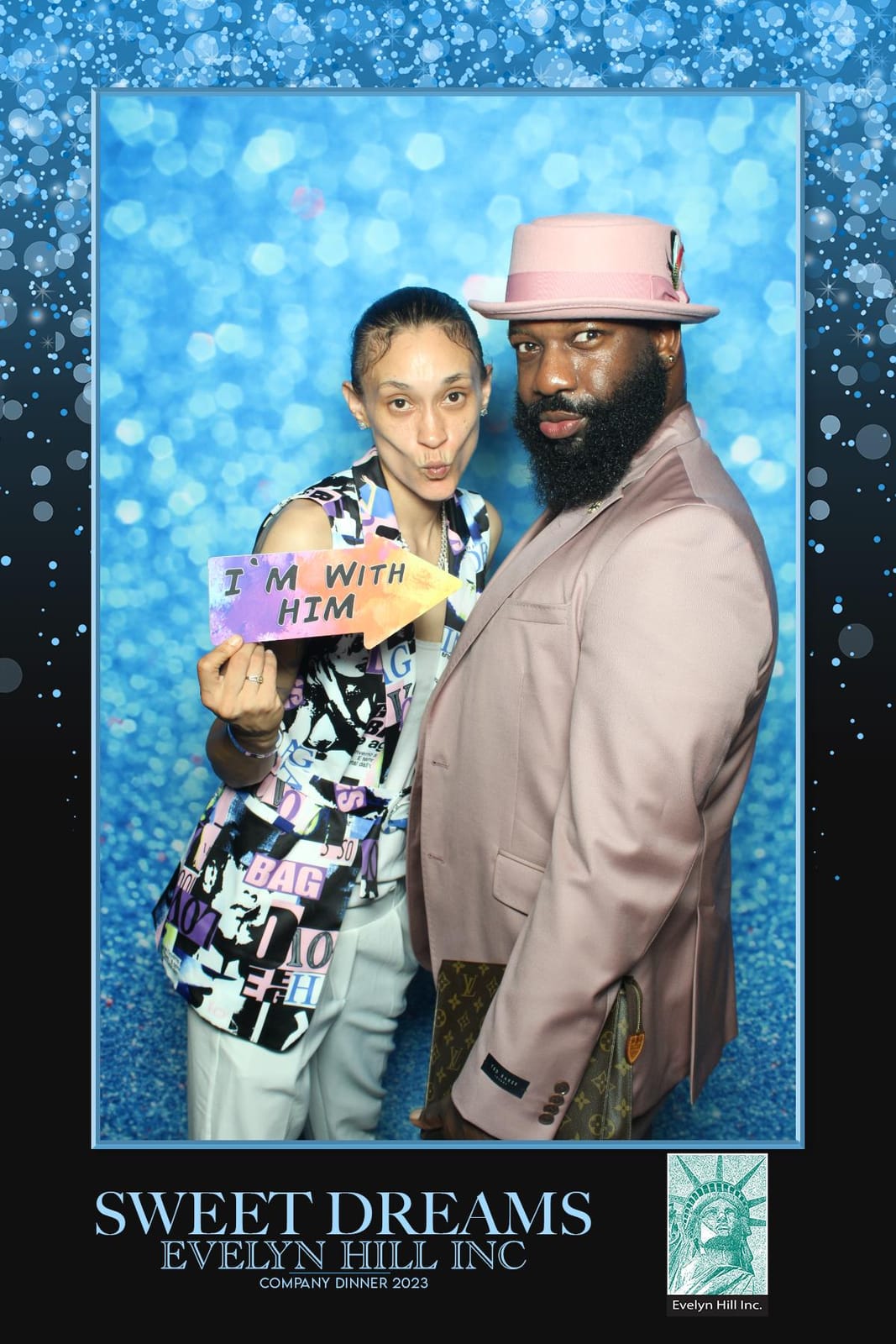 Guests posing at the Evelyn Hill Inc photo booth
