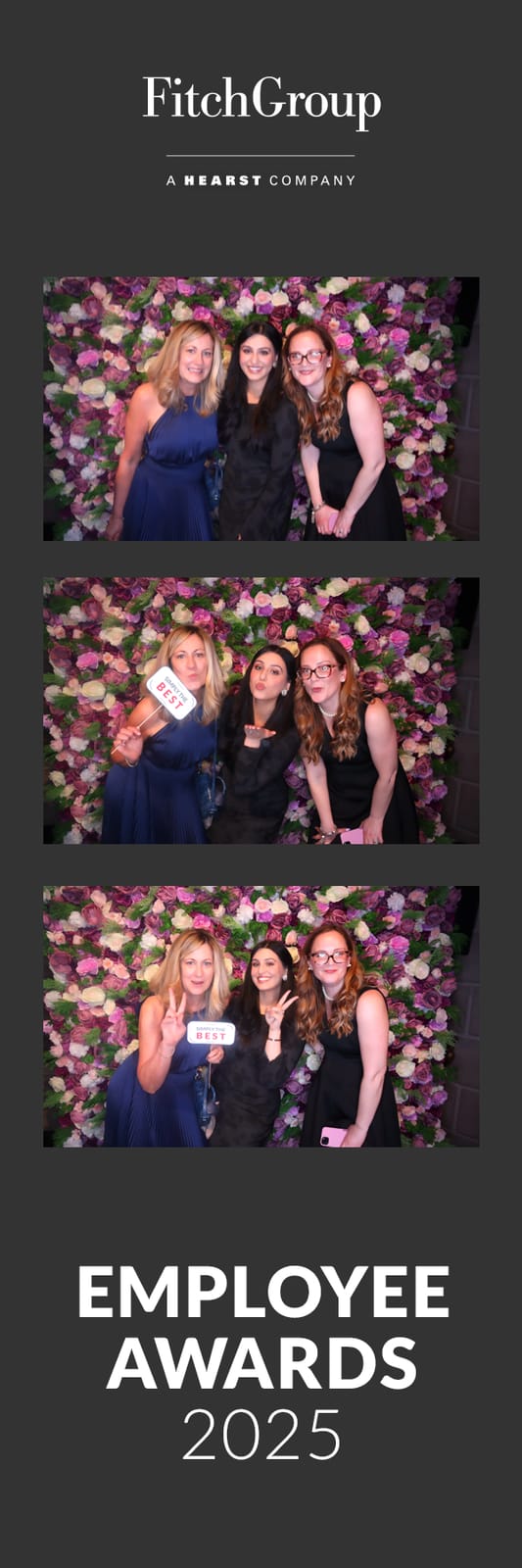 Colleagues posing with prop signs at the FitchGroup 2025 Employee Awards