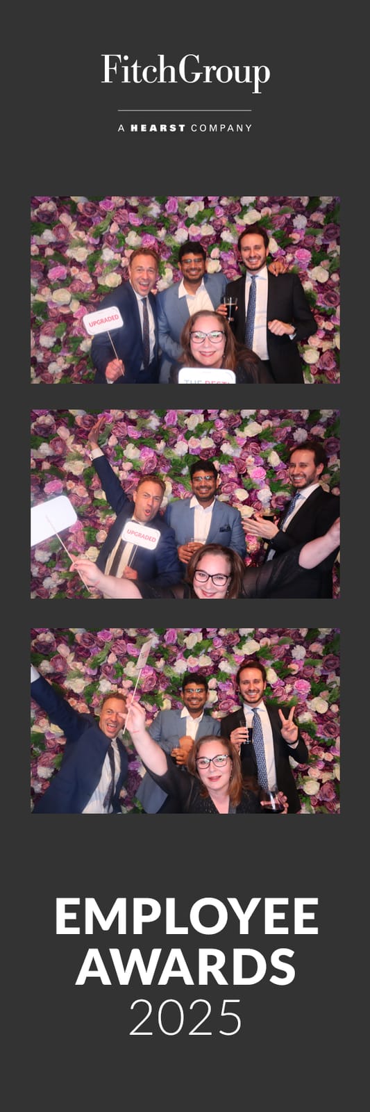 Colleagues posing together at the FitchGroup Employee Awards flower wall