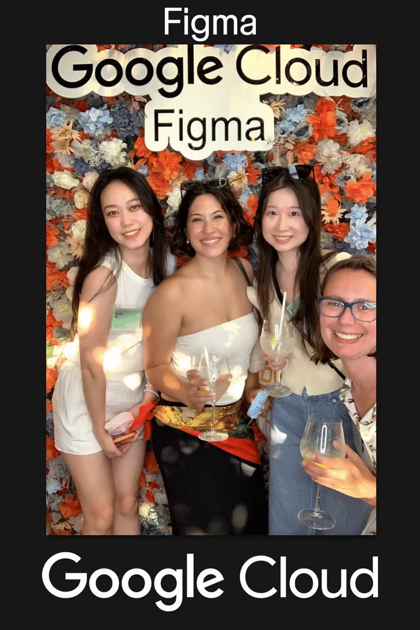 Four guests raising glasses at the Google Cloud × Figma community event photo booth