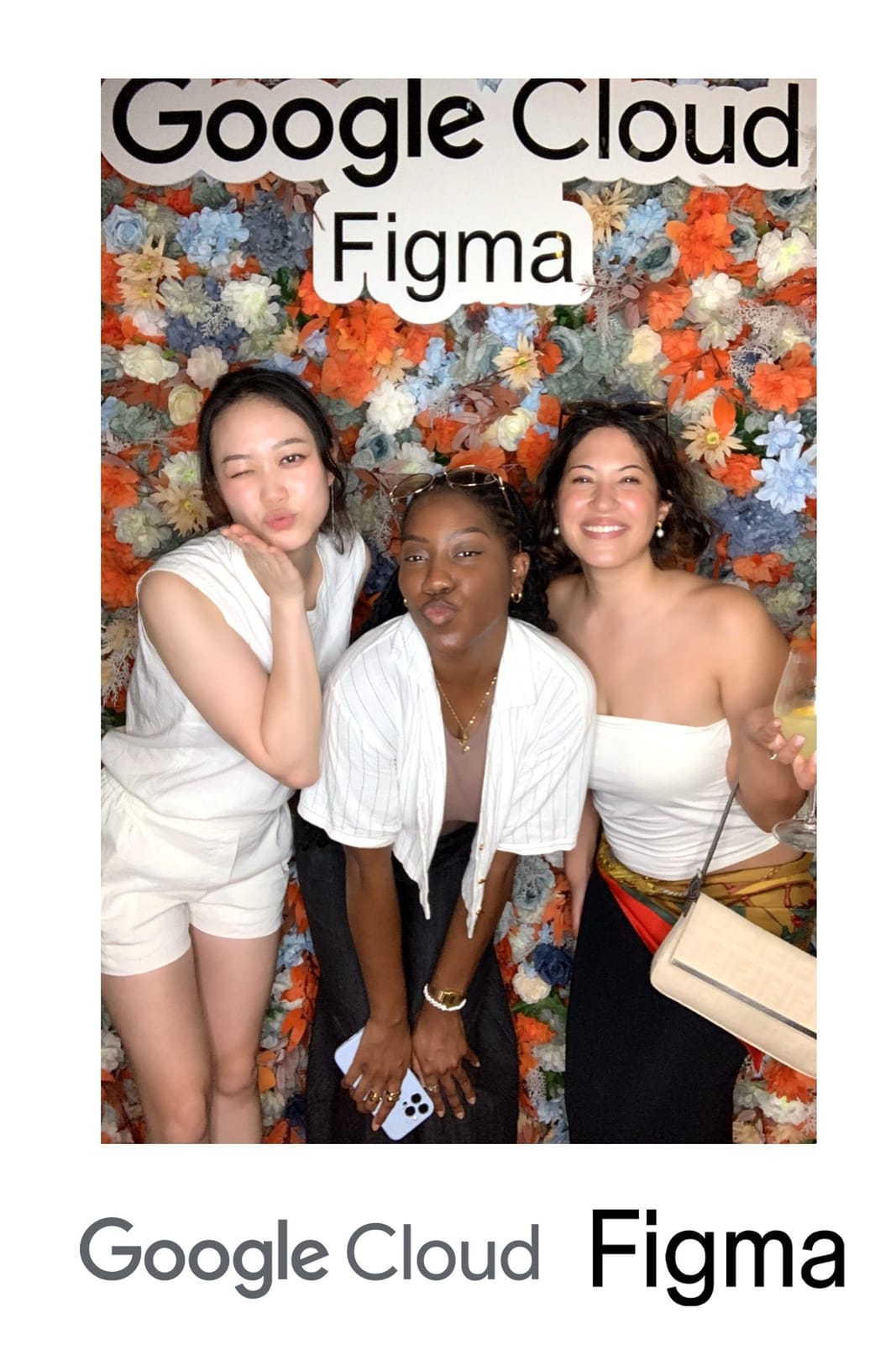 Three guests blowing kisses at the Google Cloud × Figma photo booth