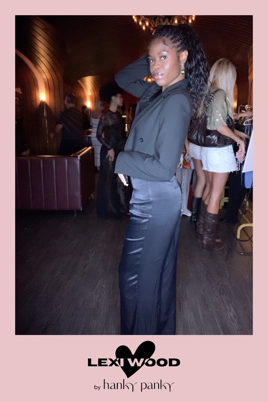 Side pose in a cropped blazer at the Hanky Panky brand launch party