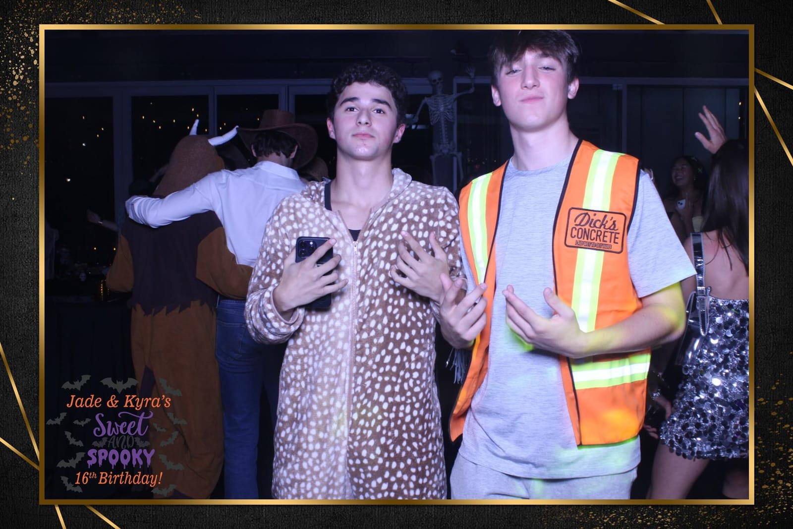 Teens in Halloween costumes at the Sweet and Spooky 16th photo booth