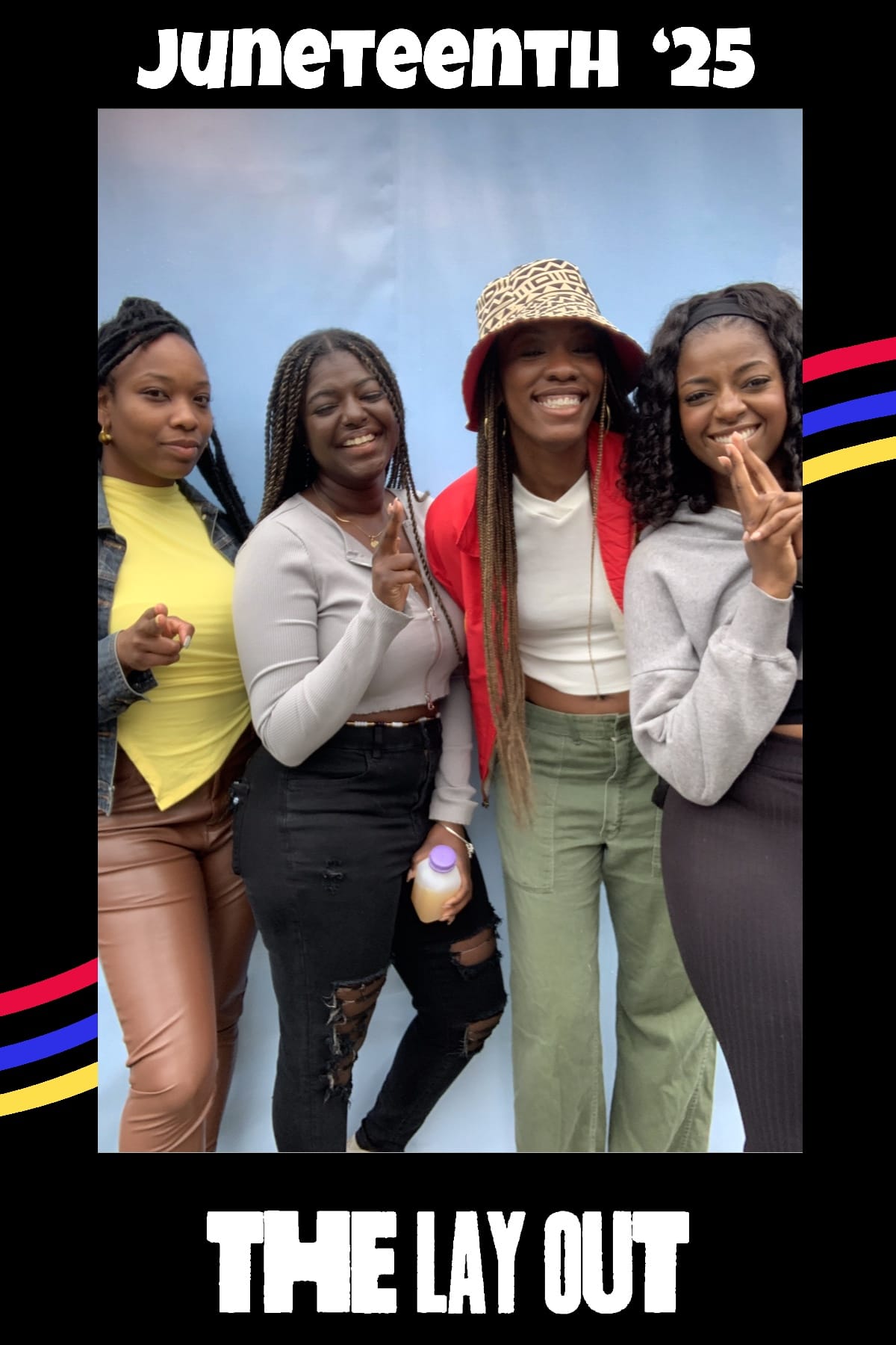 Four friends pointing at the camera — Juneteenth '25 print frame at The Lay Out