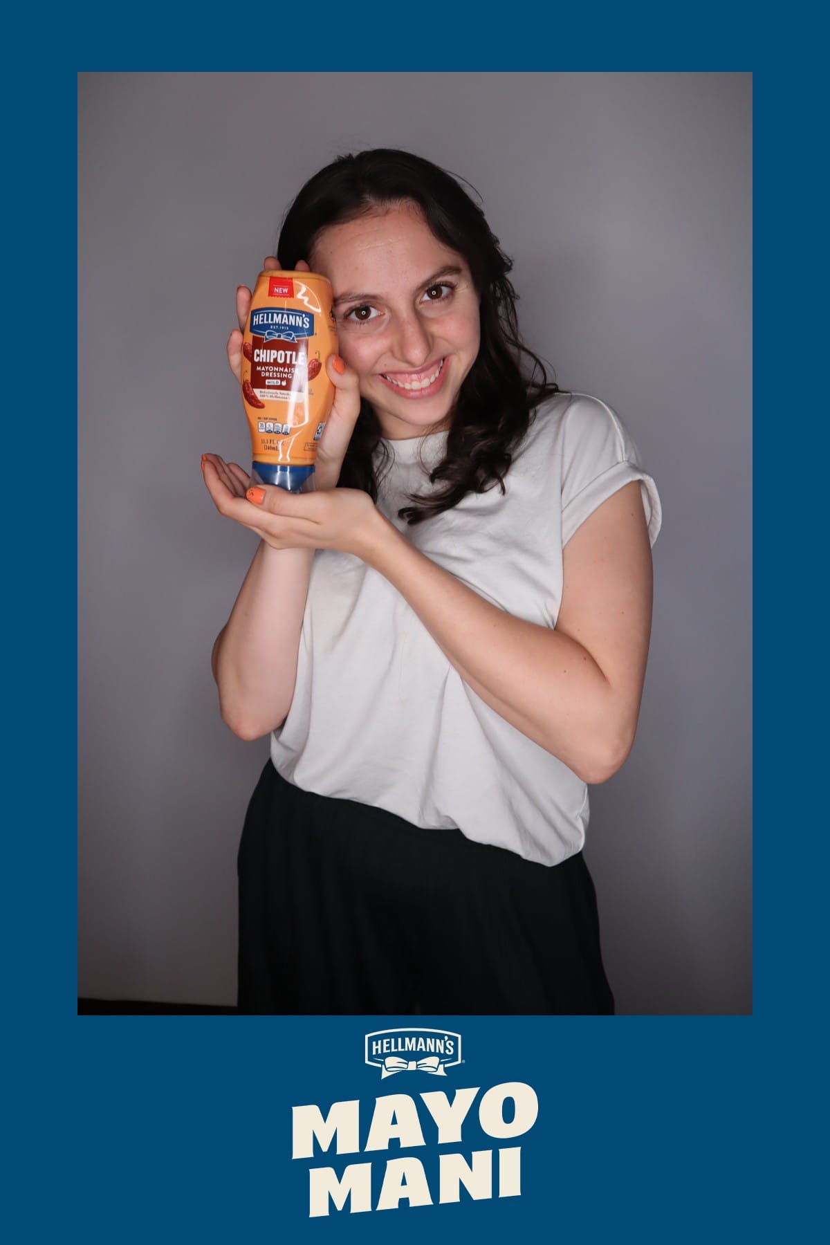 Couple posing together at the Hellmann's Mayo Mani photo booth