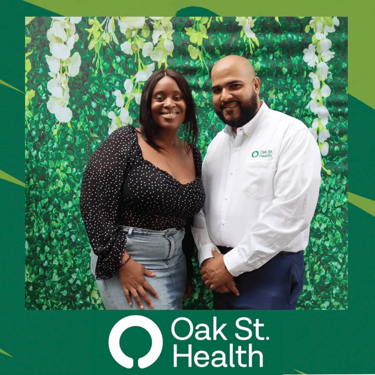 Three Oak St. Health team members posing together, one in scrubs