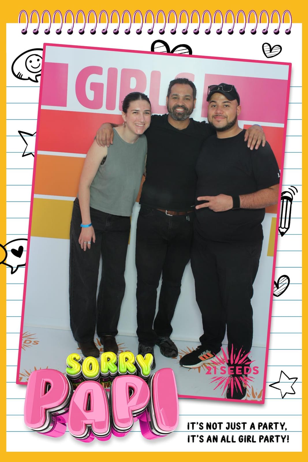 Three guests posing at the Sorry Papi x 21 Seeds party — pink notebook print frame