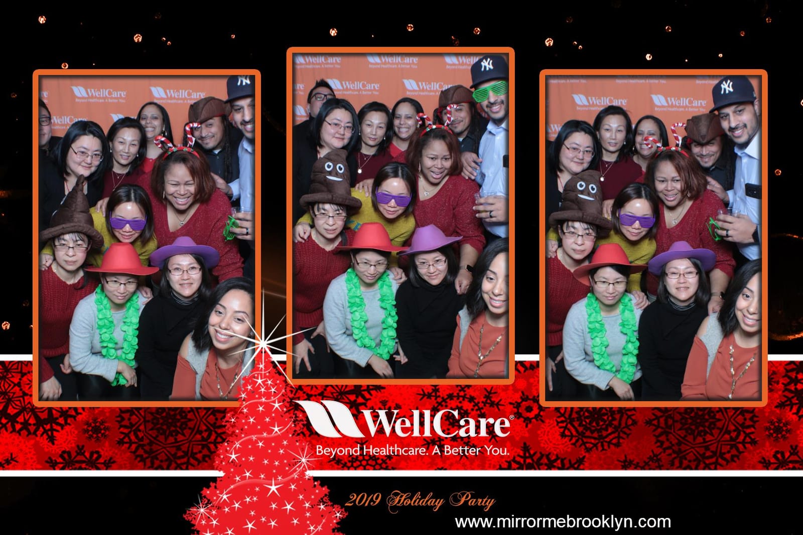 Colleagues with It's My Party sign at the WellCare Holiday Party