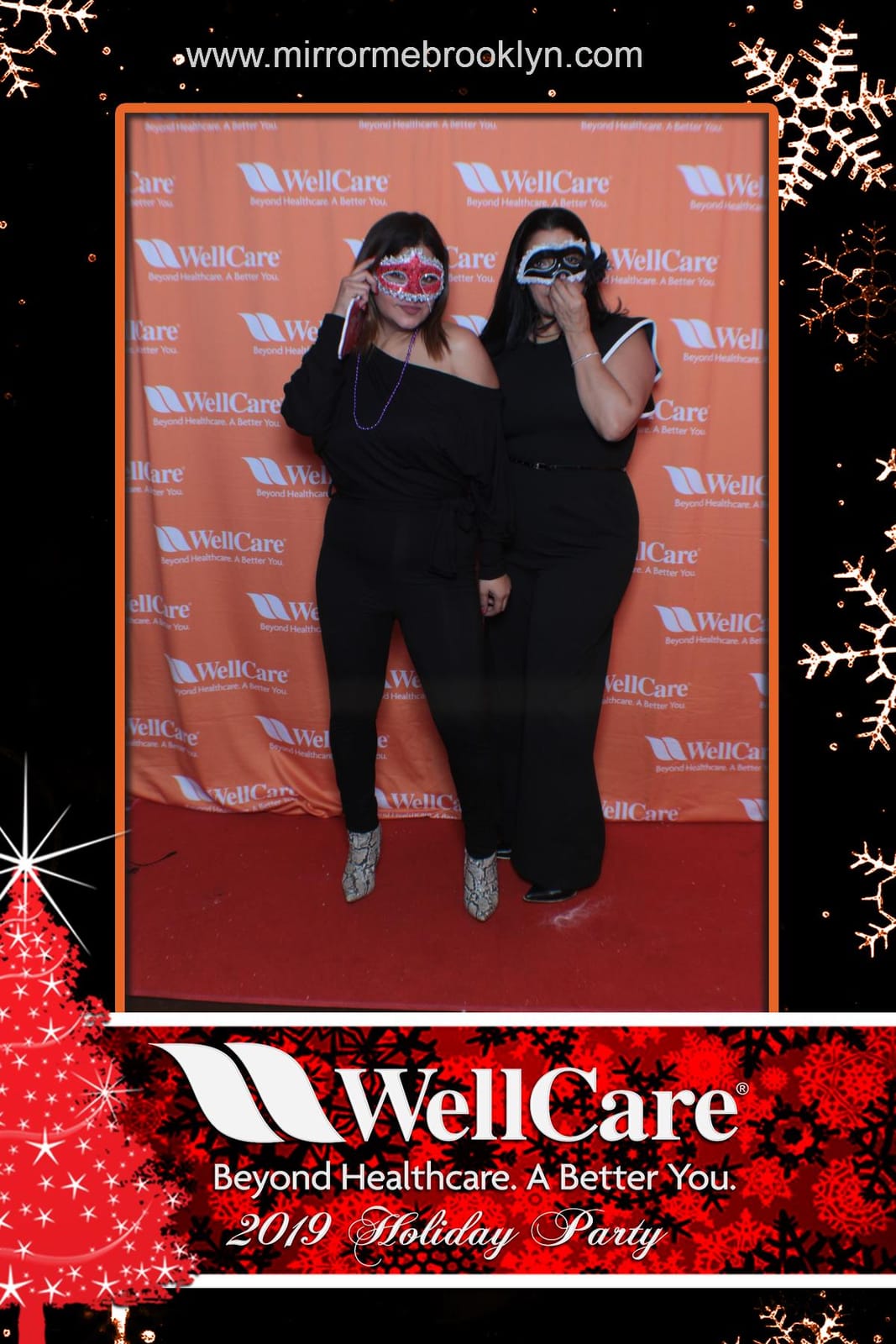 Guests celebrating at the WellCare 2019 Holiday Party booth