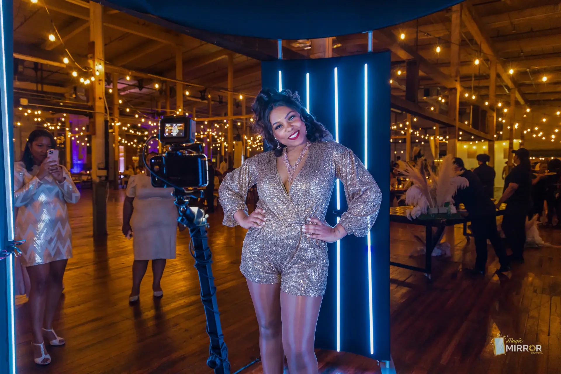 Guests posing in a burst session at the GIF booth at an NYC event — photo 1