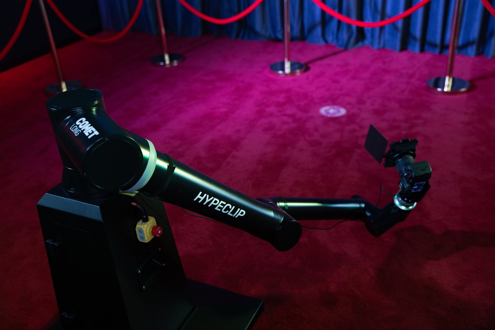 Glambot robotic camera arm set up on a red carpet