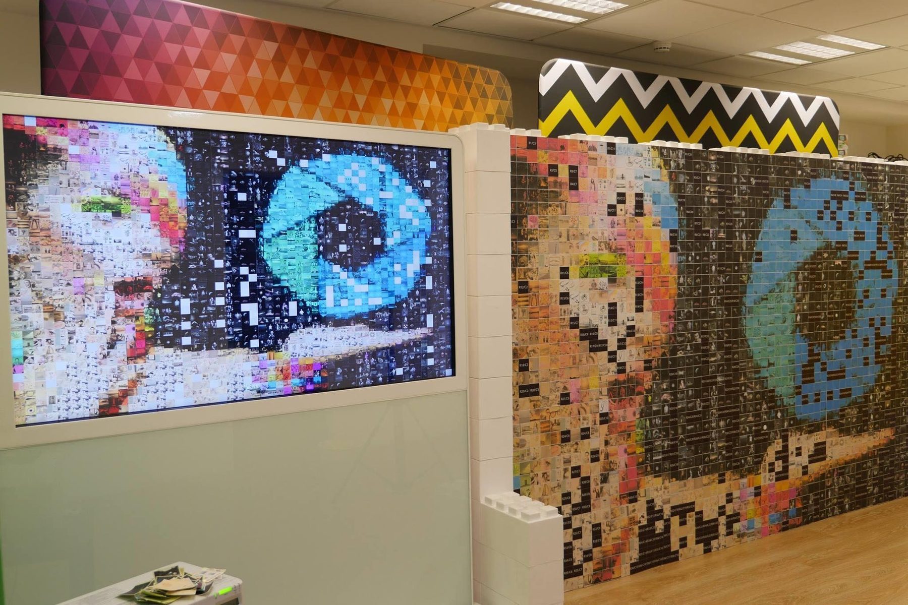 Photo mosaic wall building into a company logo at a corporate event