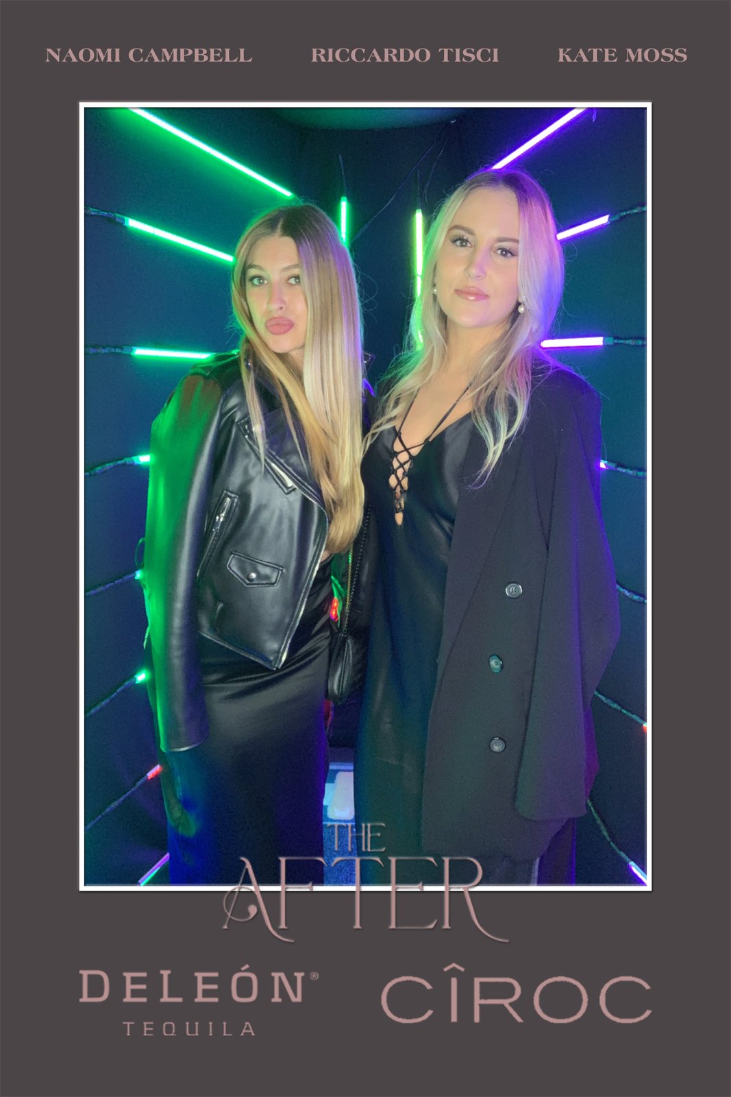 Two guests posing in the vogue booth lighting