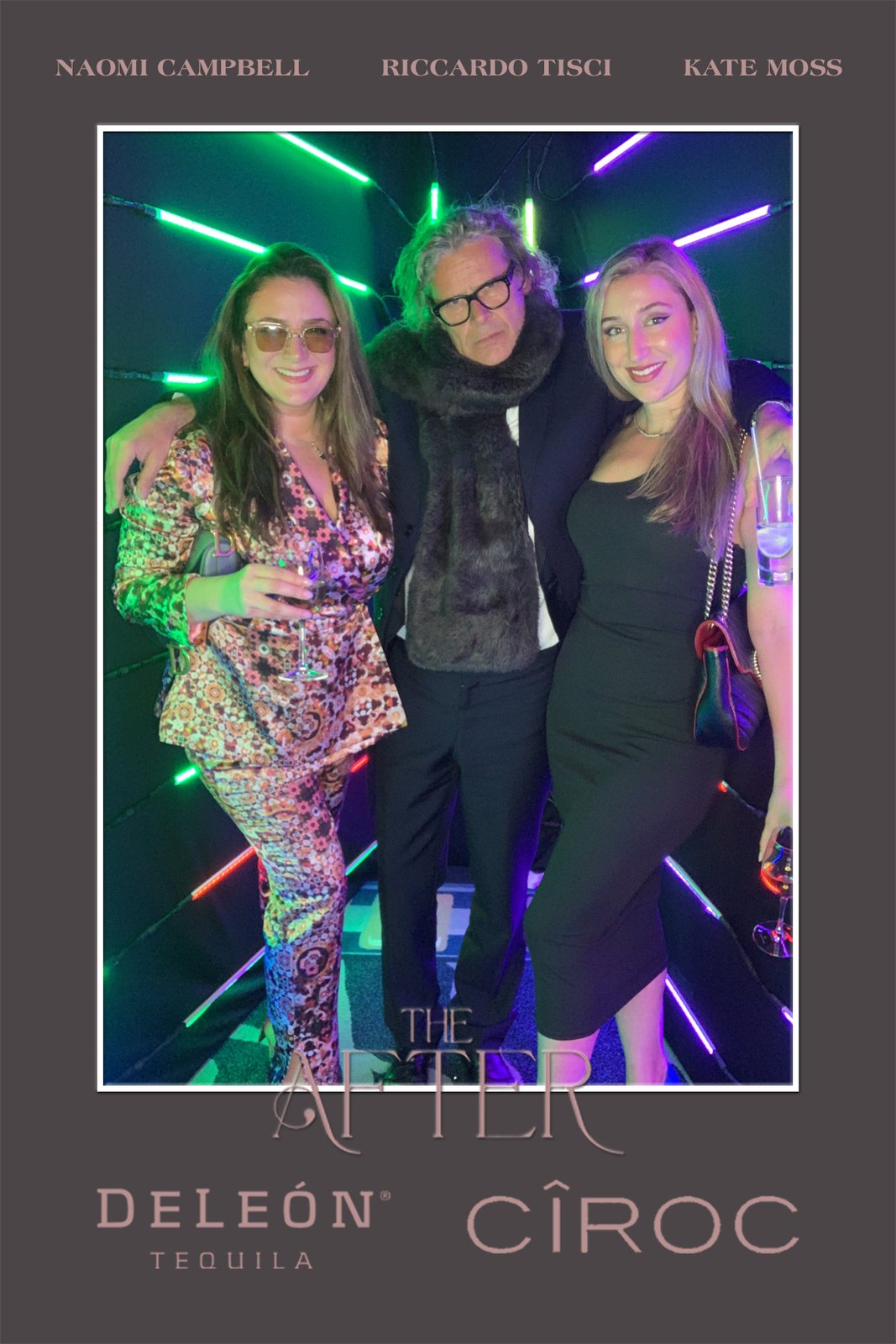 Group of friends dressed up at the vogue booth